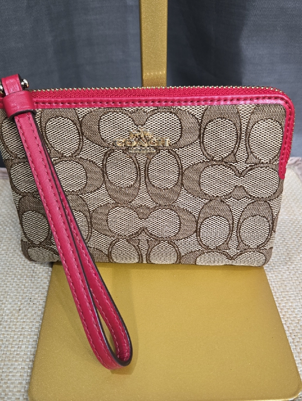 Coach Brown Signature Canvas Wristlet with Pink Trim